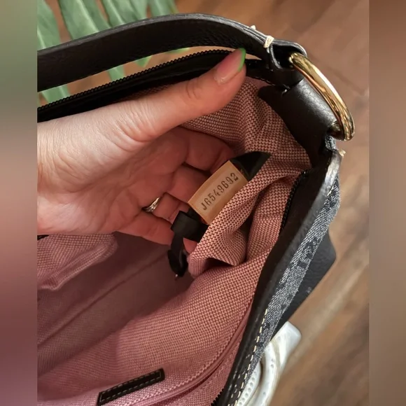 Dooney & Bourke Black Monogram Shoulder Bag with Perforated Leather and Tassels - Picture 5 of 11